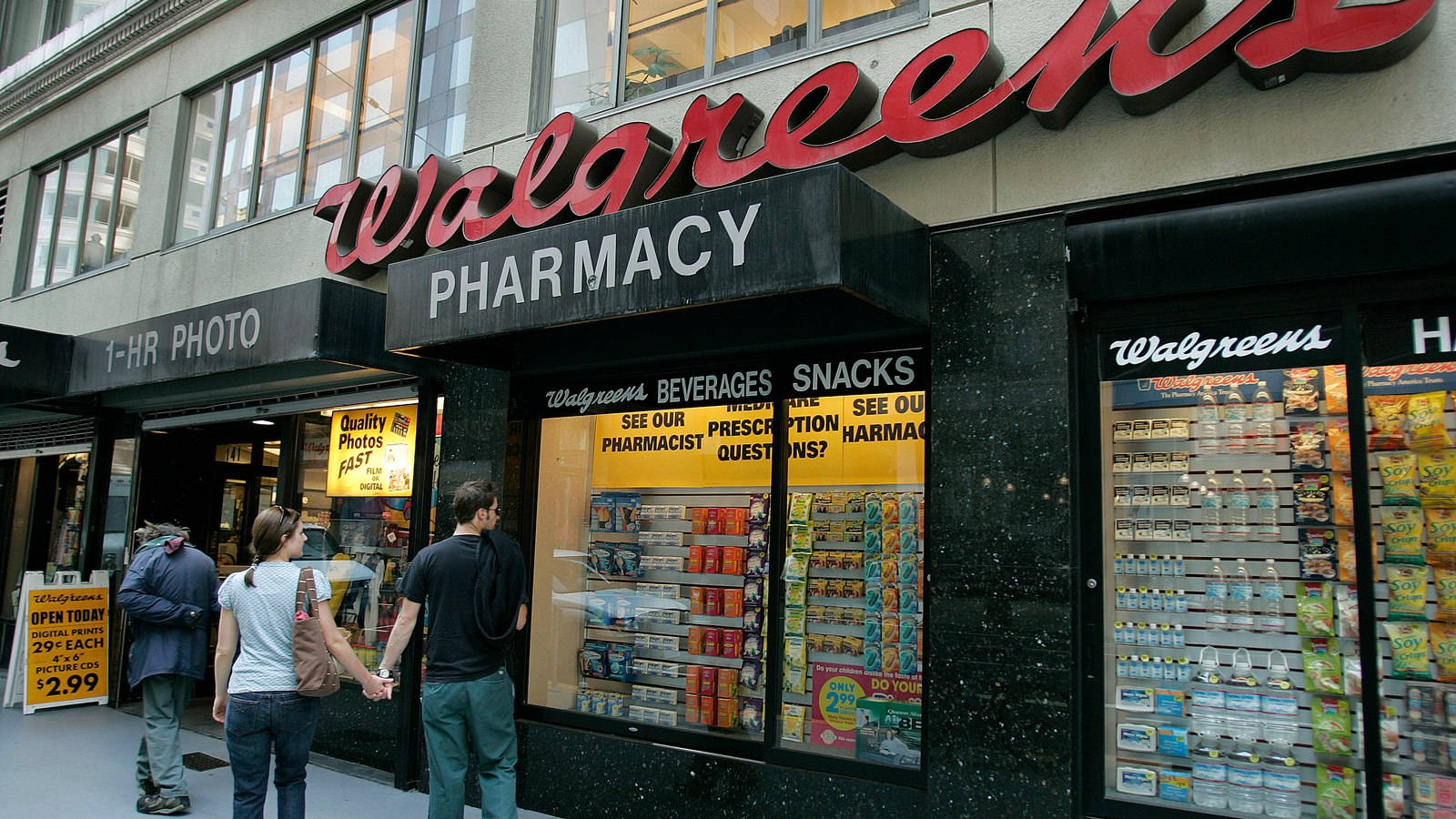 Couple Near Walgreens Pharmacy Background