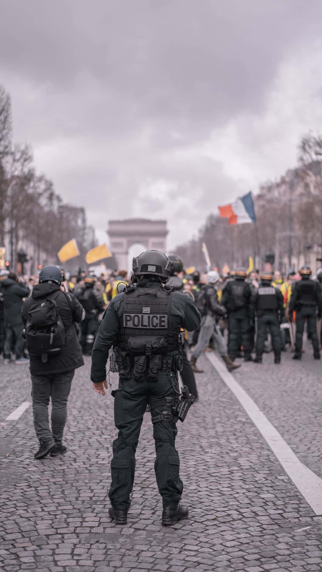 Courageous Policeman Standing Alert On Duty