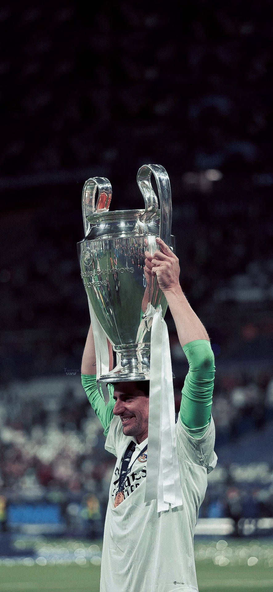 Courtois Holding Champions League Trophy Background