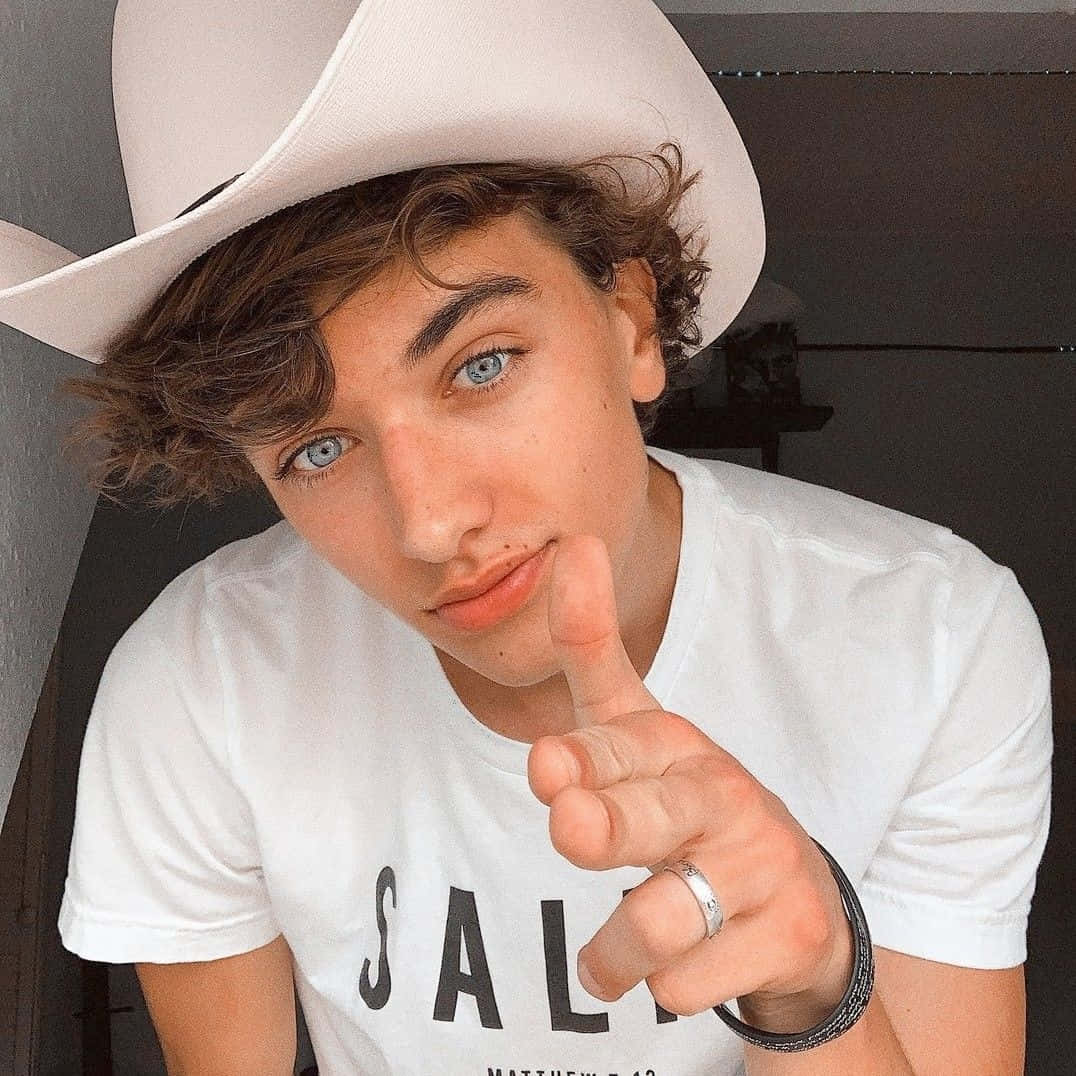 Cowboy Hat Blue Eyes Pointing