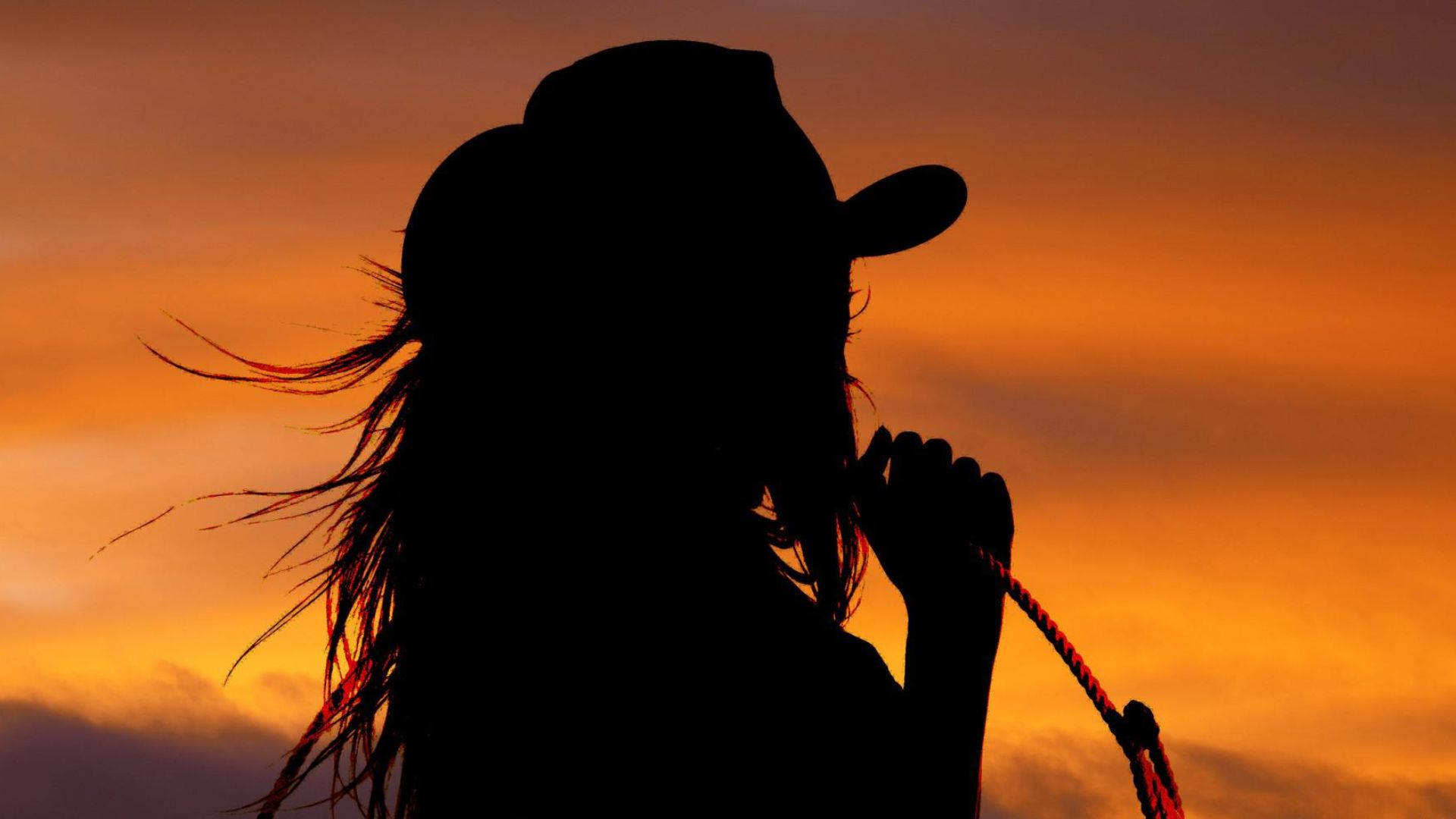 Cowgirl Holding A Rope Background