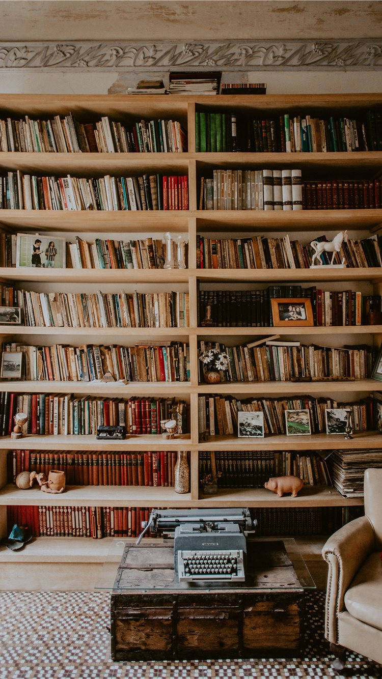 Cozy Room With Wooden Bookshelf Background