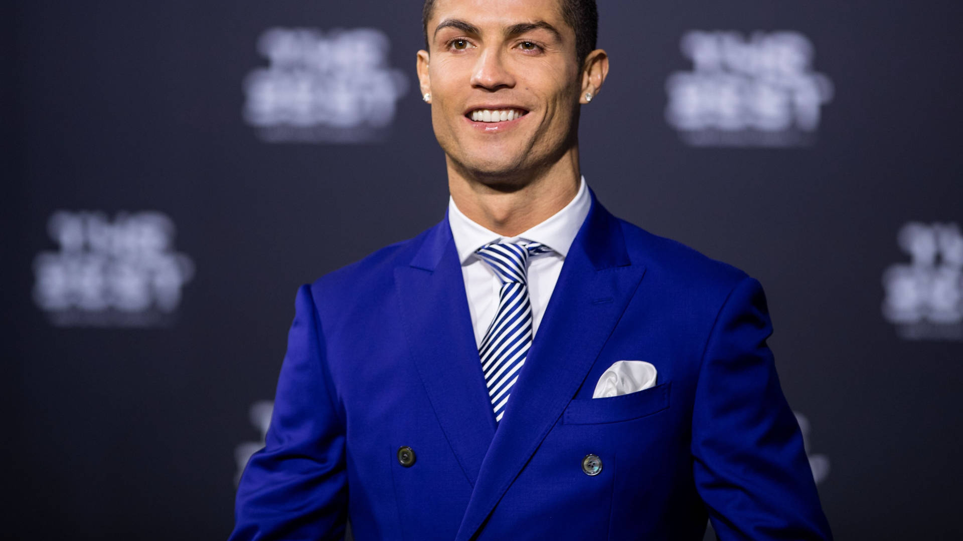 Cr7 Hd In Blue Suit Background