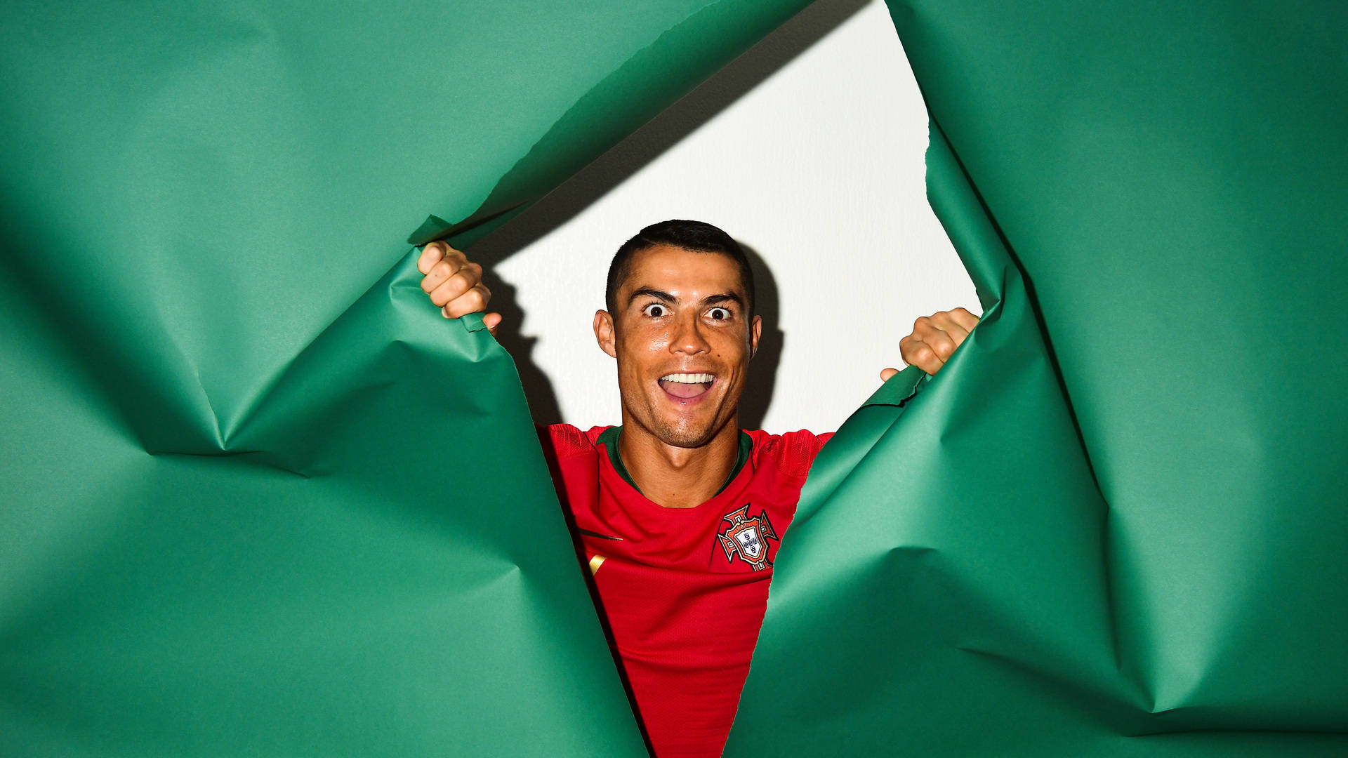 Cr7 Hd Ripping Green Paper Background