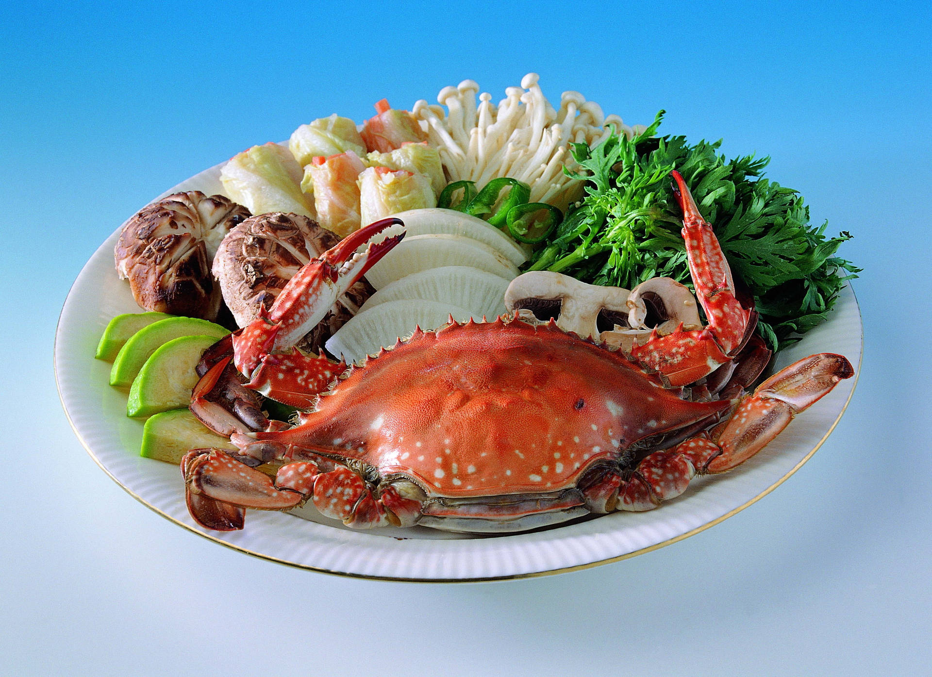 Crab In Plate With Vegetables Background