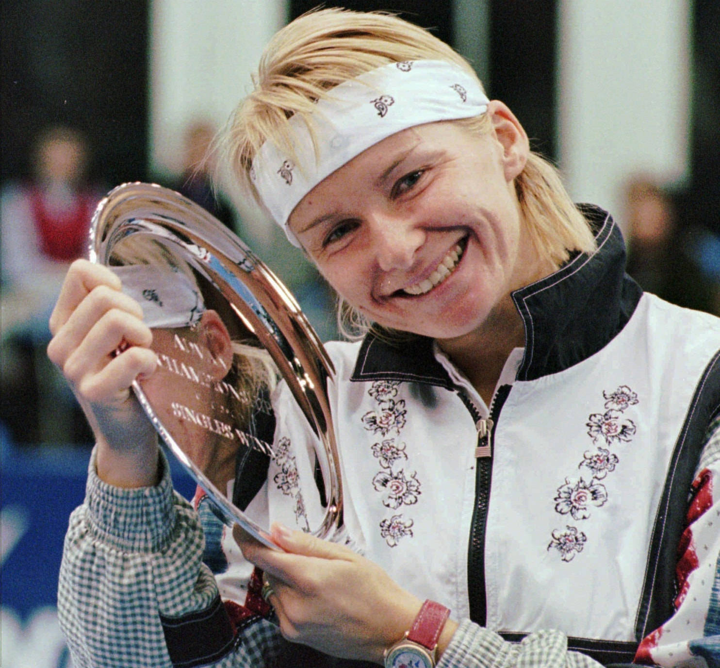 Cradling Trophy Jana Novotna Background