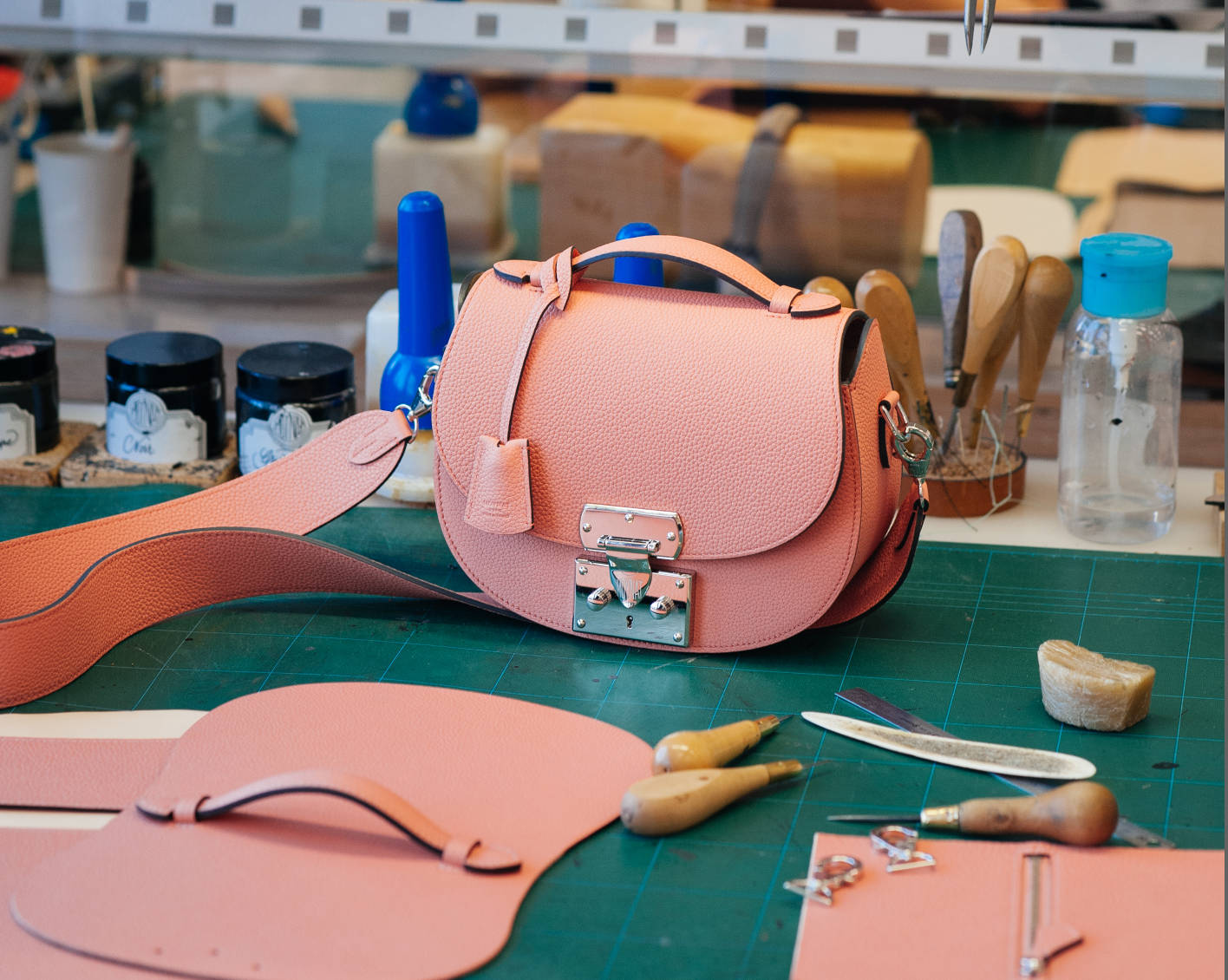 Crafting Luxury: Beautifully Assembling A Moynat Bag Background