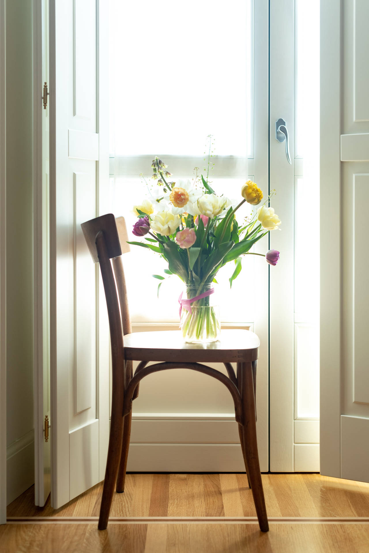 Craspedia And Roses Flower Bouquet On Wooden Chair Background