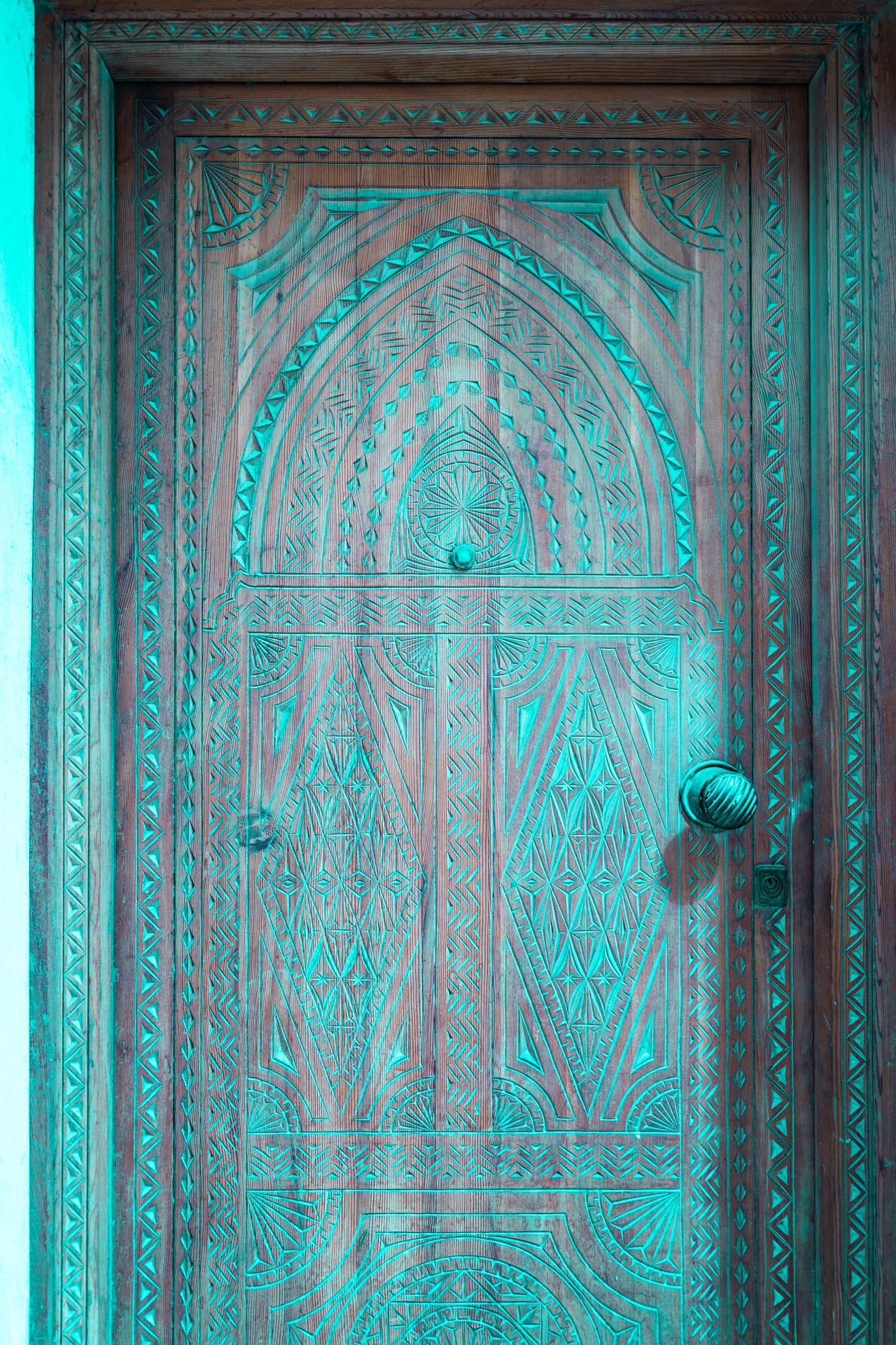 Craved Wooden Door In Moroccan Framework Background