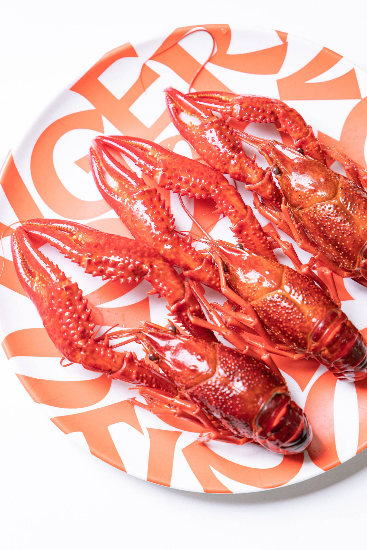 Crayfish Dish In Orange Plate Background