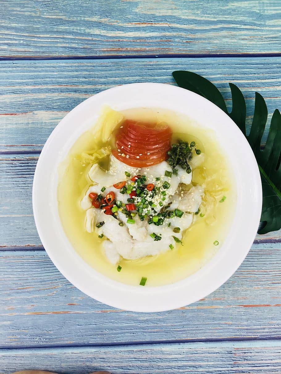 Creamy Bouillabaisse Dish On Painted Wooden Table Background