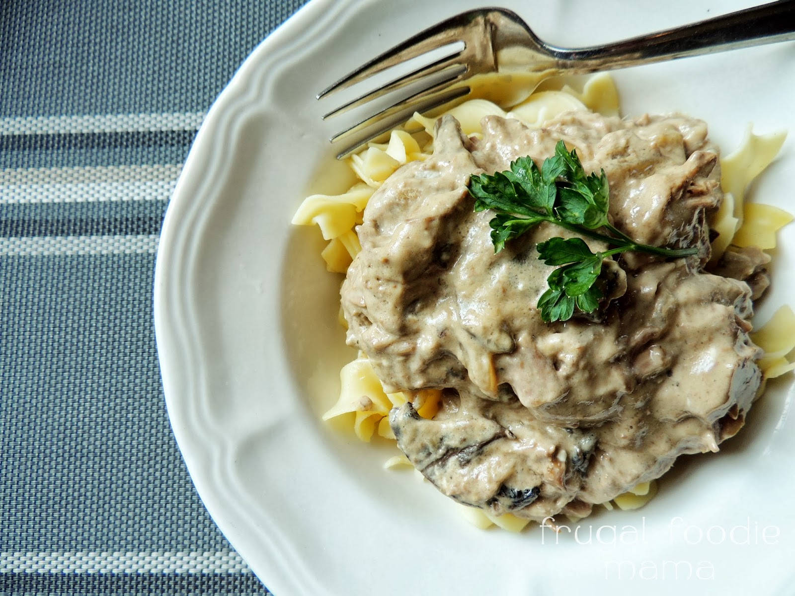 Creamy Russian Cuisine Beef Stroganoff On Pasta Background