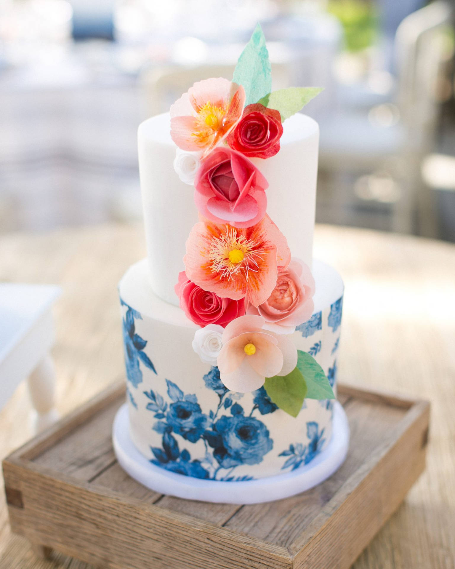 Creatively Painted Wedding Cake With Flowers Background