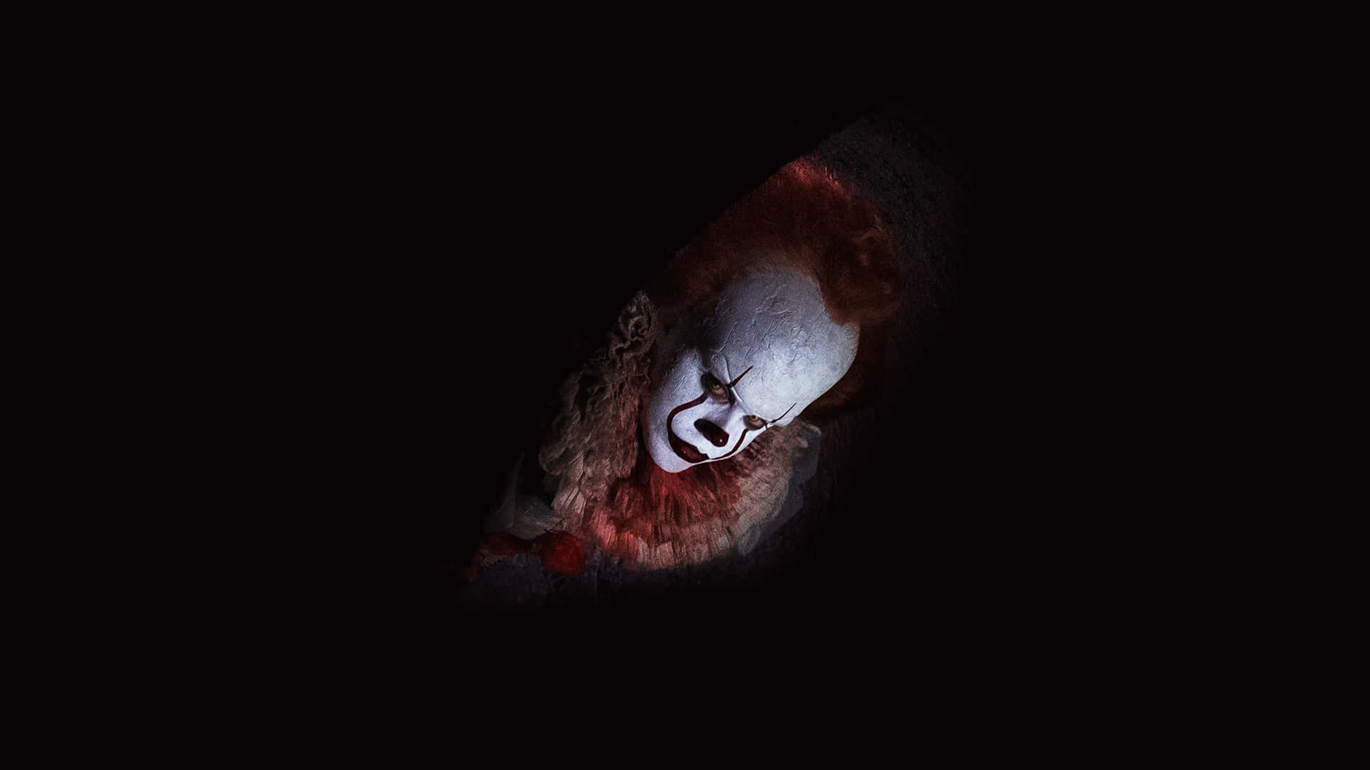 Creepy_ Clown_in_ Darkness Background