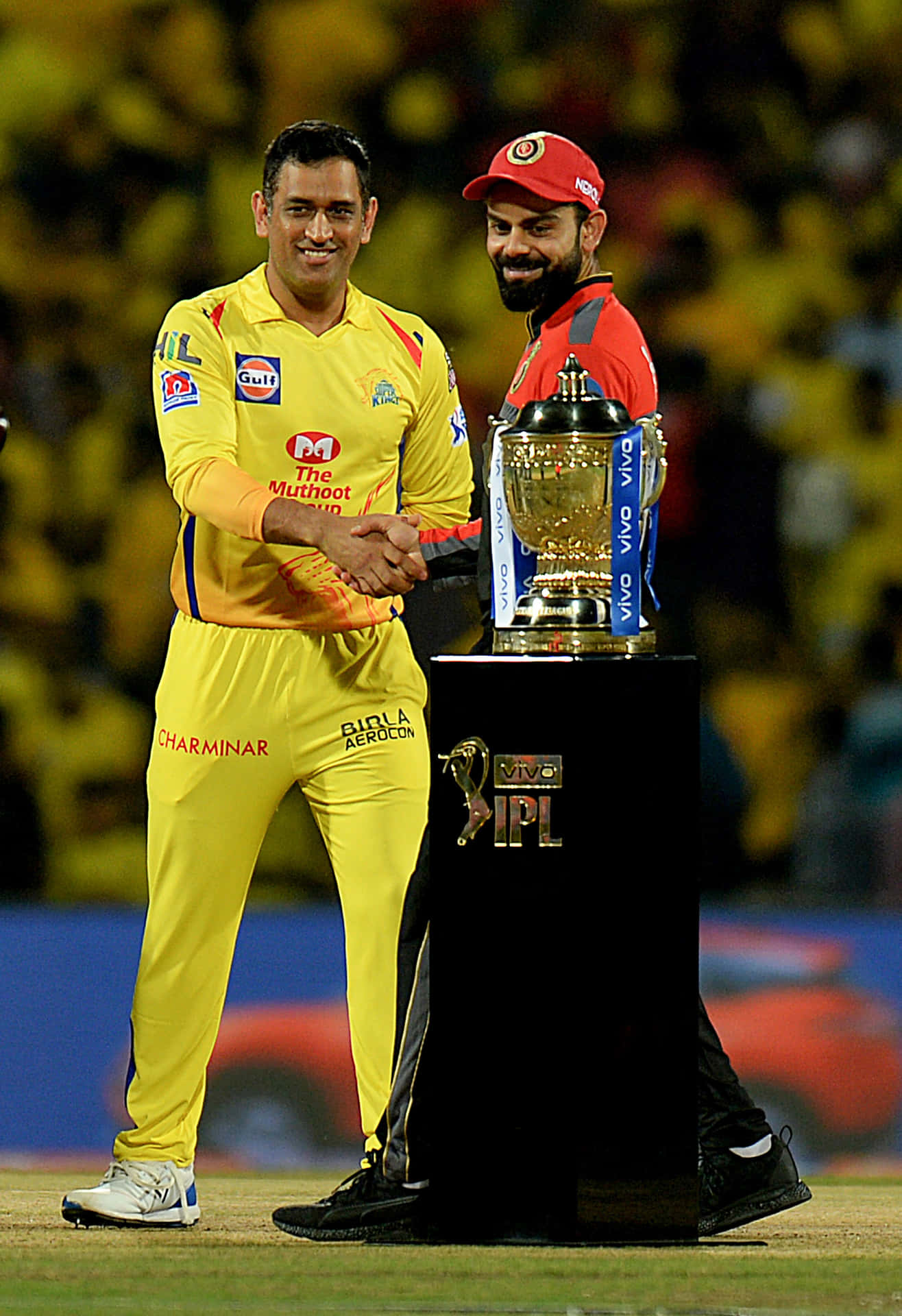 Cricket Captains Shake Hands I P L Trophy Background