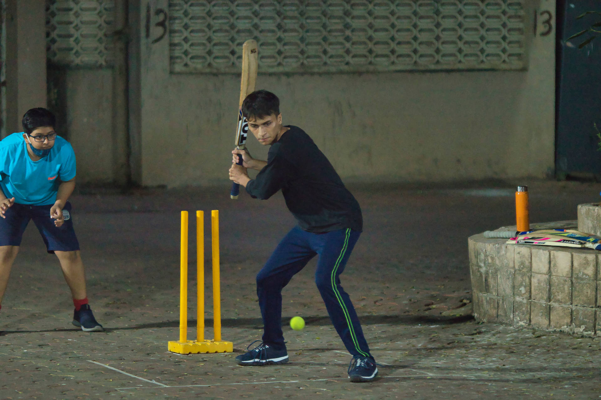 Cricket Players In The Street Background