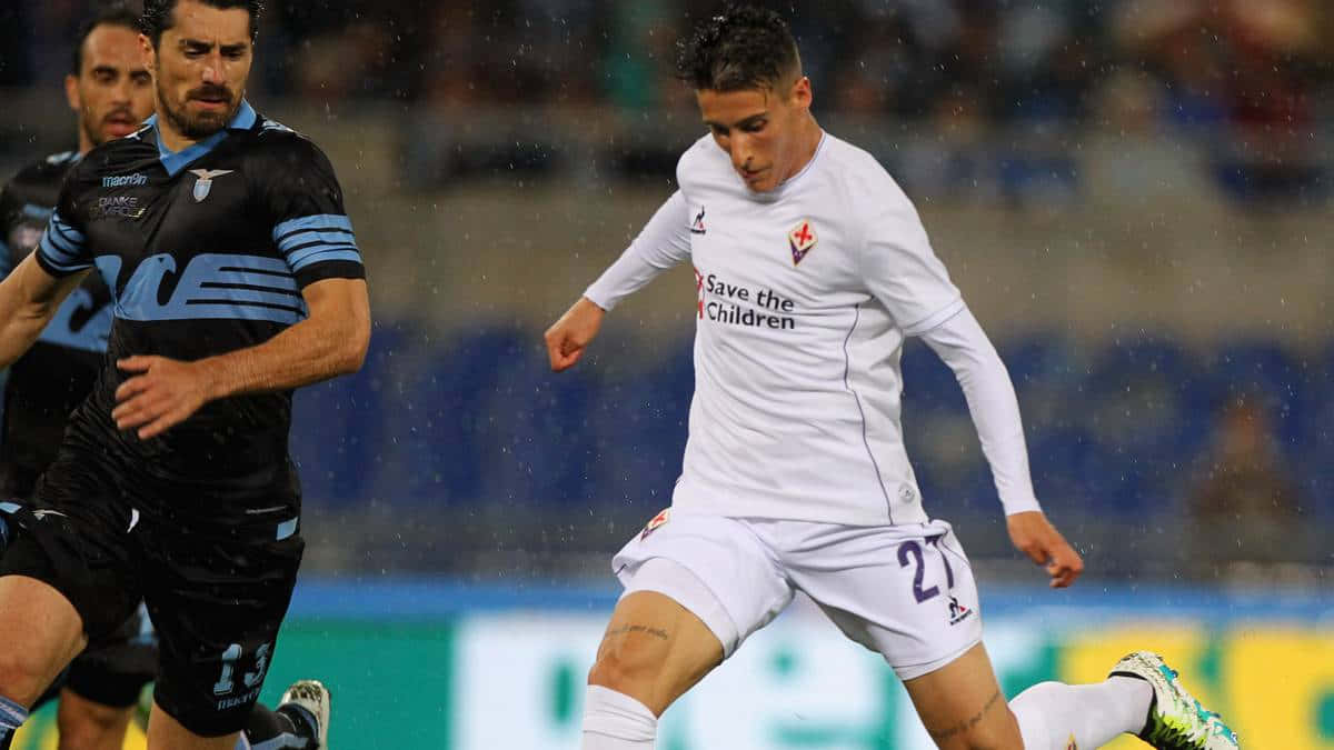 Cristian Telloin Action During Match Background