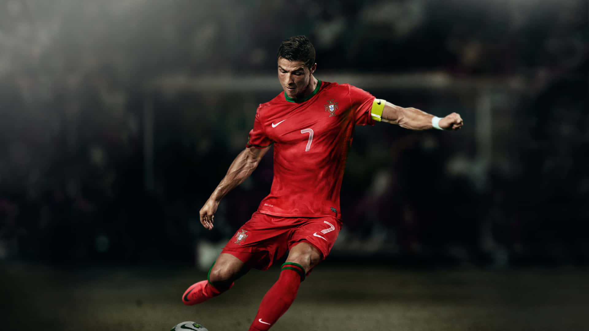 Cristiano Ronaldo Scoring A Goal While Competing In The World's Most Beloved Sport. Background