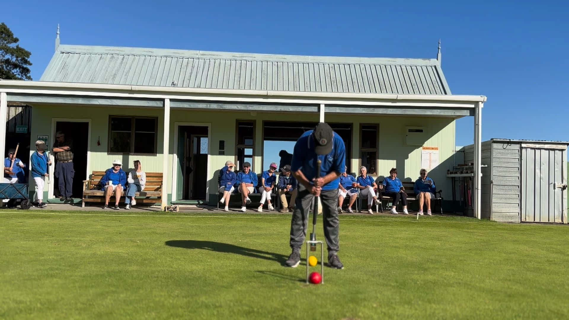 Croquet Player Concentrationat Club Background