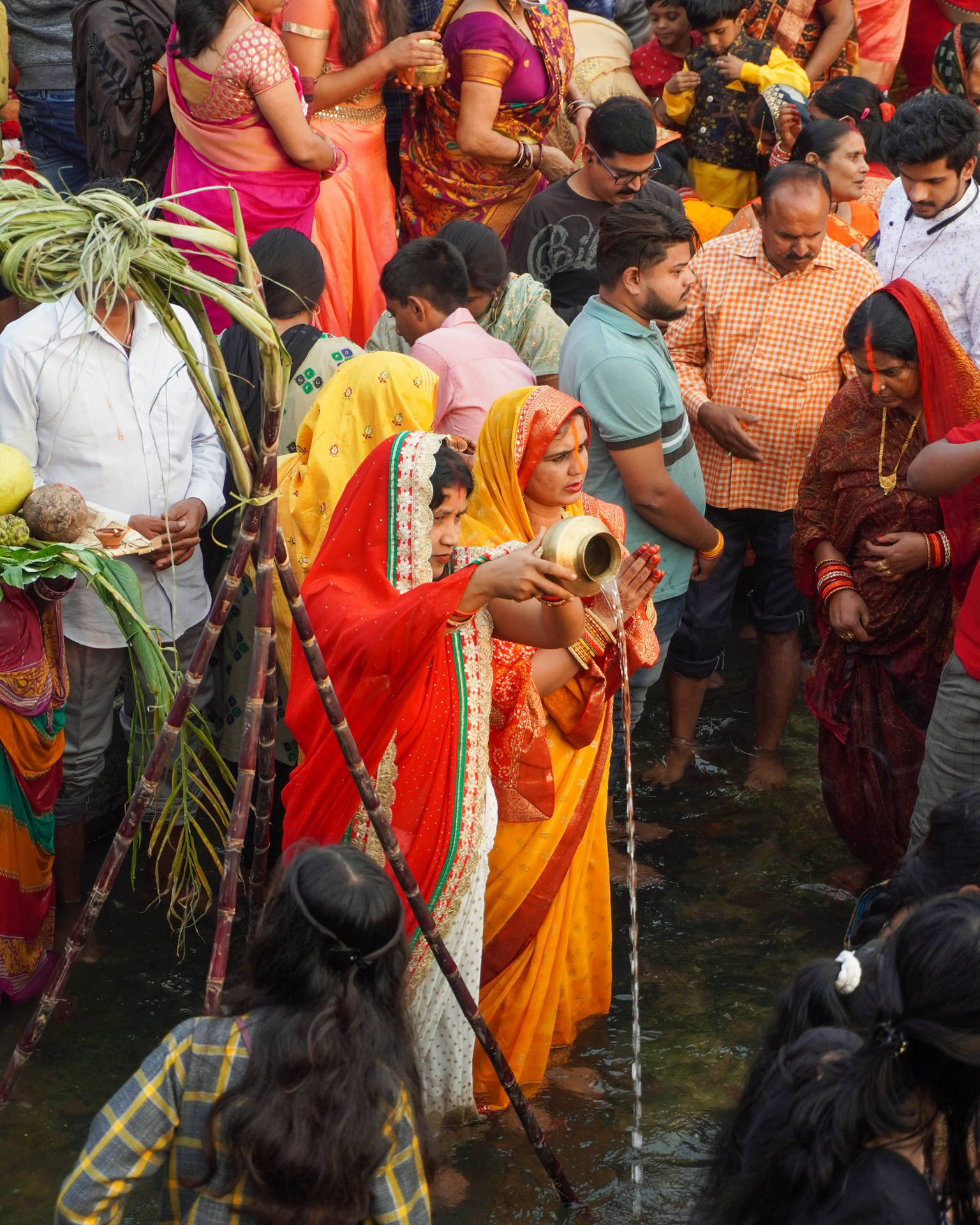 Crowd With Feet Submerged Chhath Puja