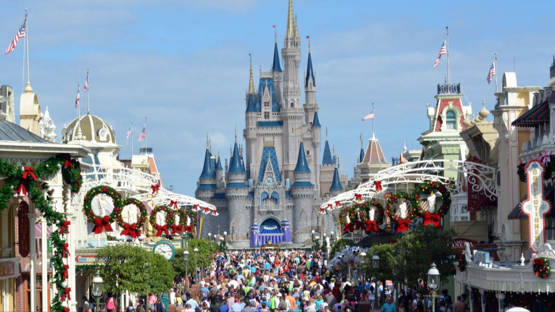 Crowded Pathway At Walt Disney World Desktop Background