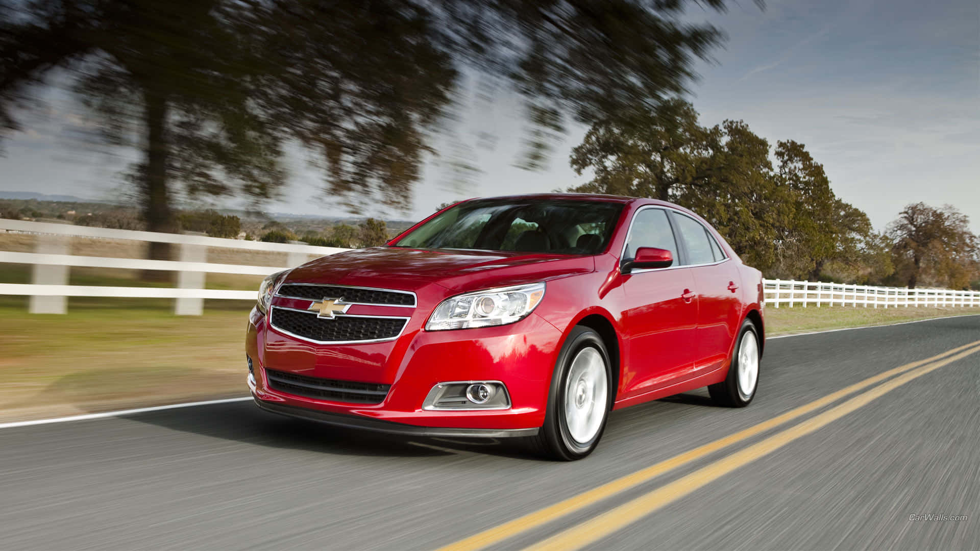 Cruise In Style With A Chevy Malibu Background