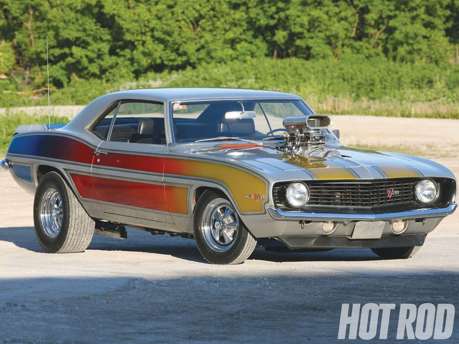 Cruise On The Open Road In A Classic Chevy Background