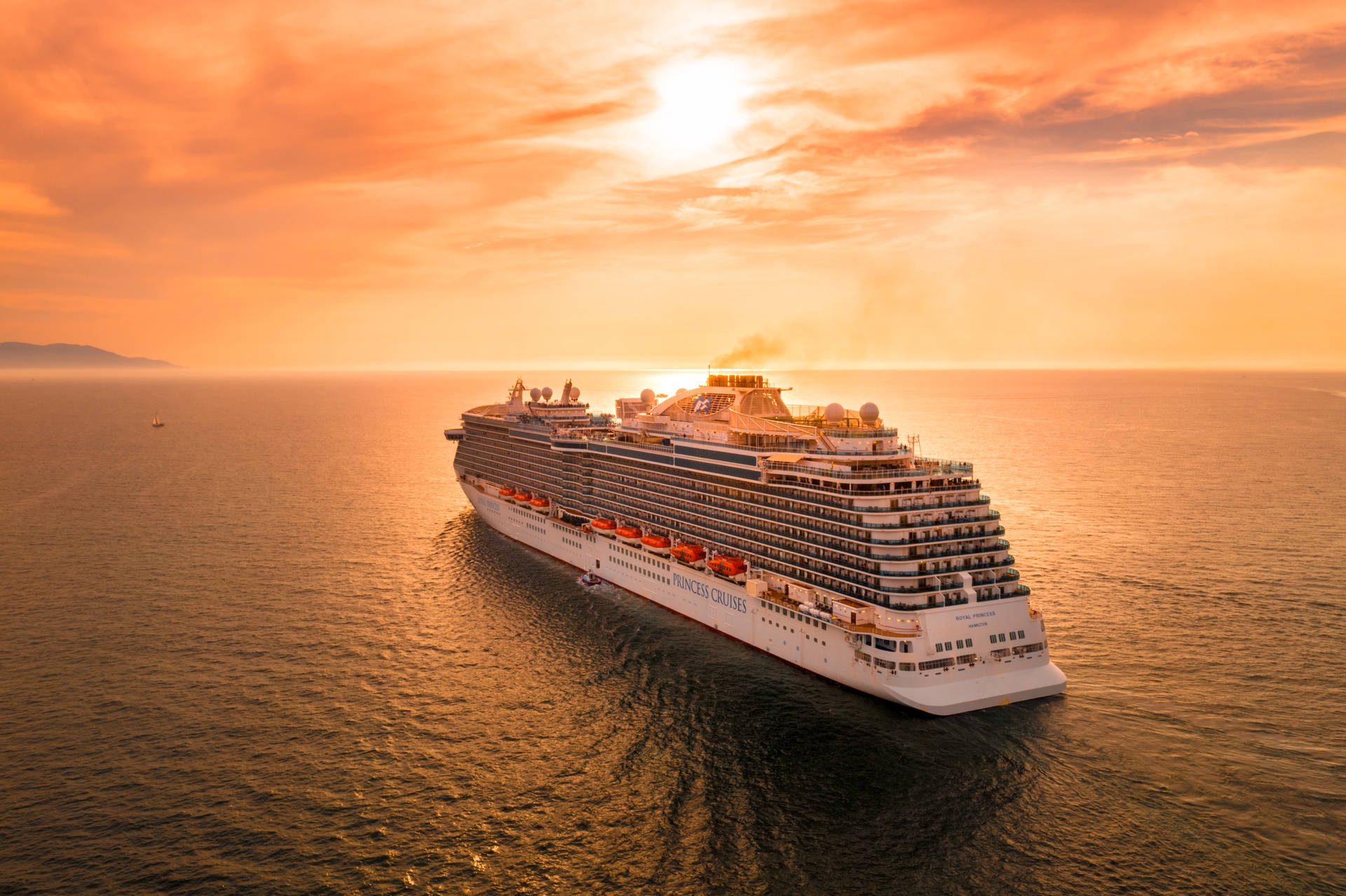 Cruise Ship Orange Sunset Background