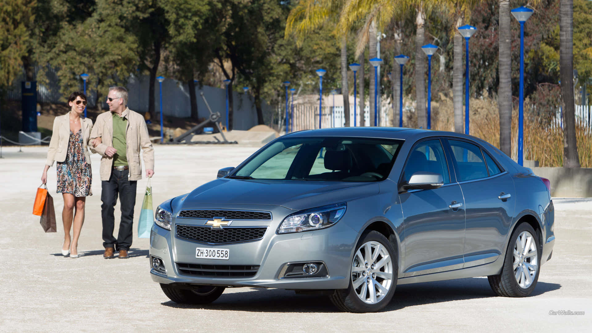 Cruise The Streets In Style With A Chevy Malibu Background