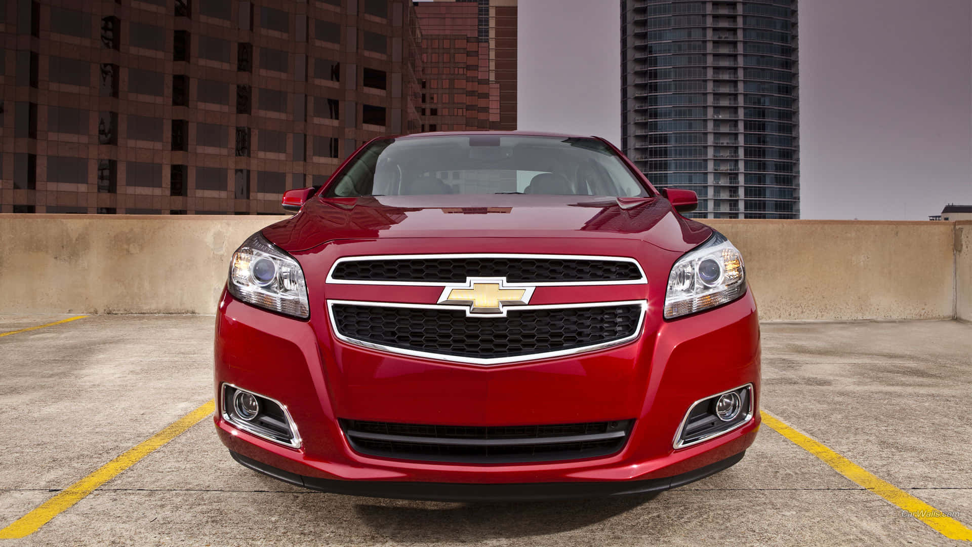 Cruise The Streets In Style With The Sleek Chevy Malibu Background