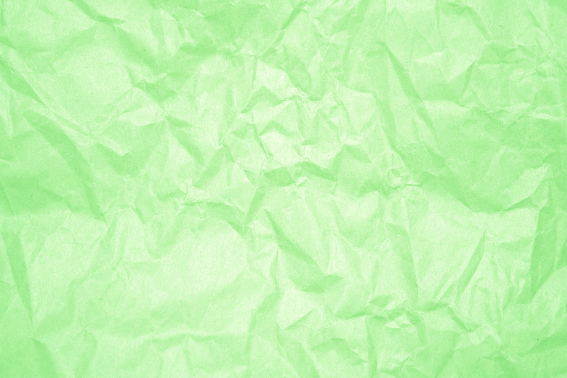 Crumpled Light Green Paper Background