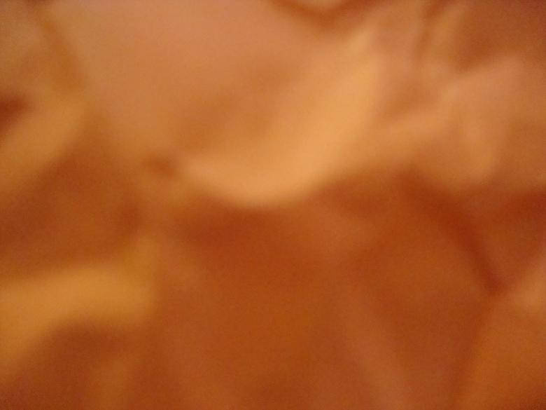 Crumpled Orange Paper Texture Background