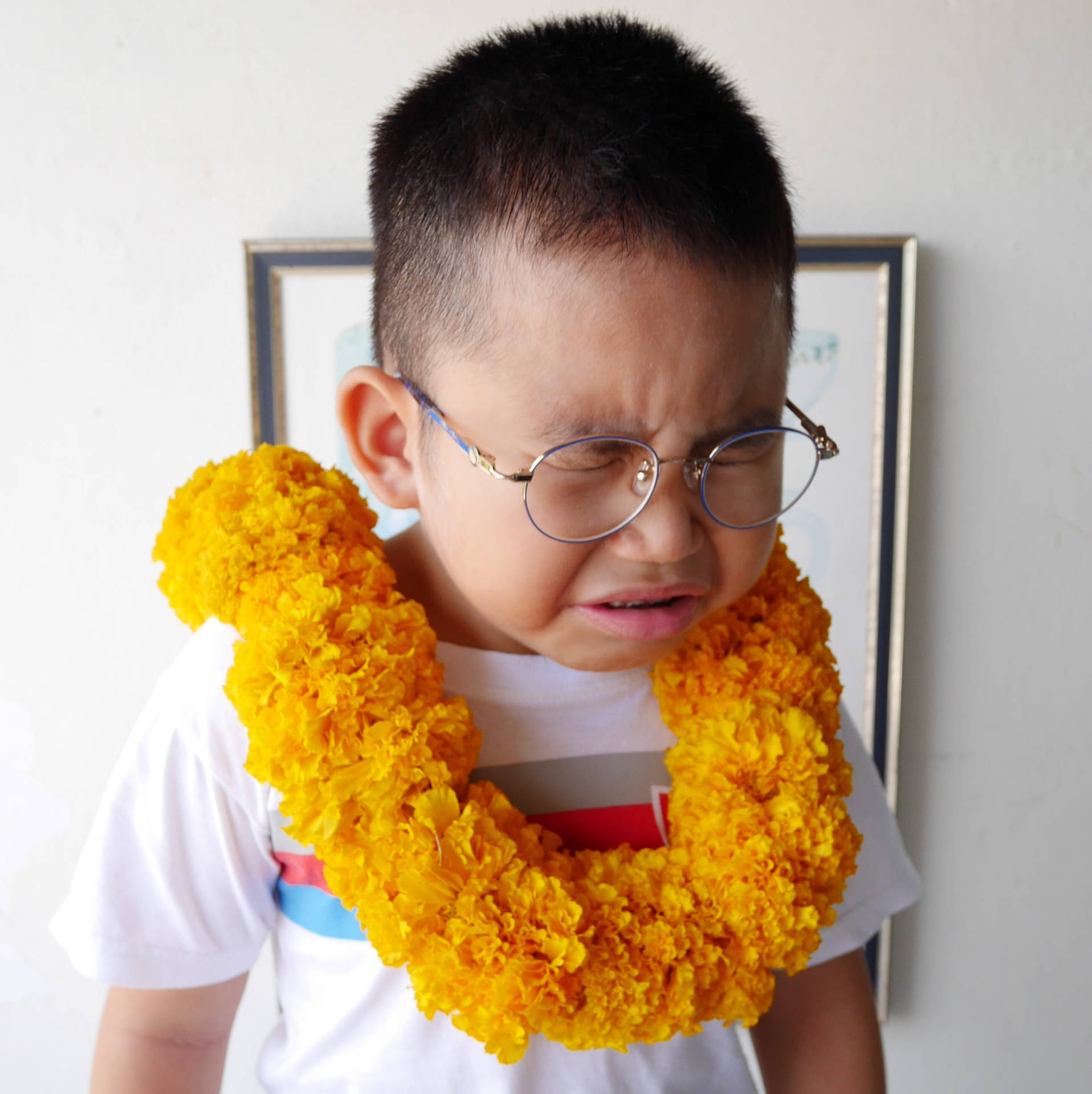 Crying Sad Boy With Garland Background