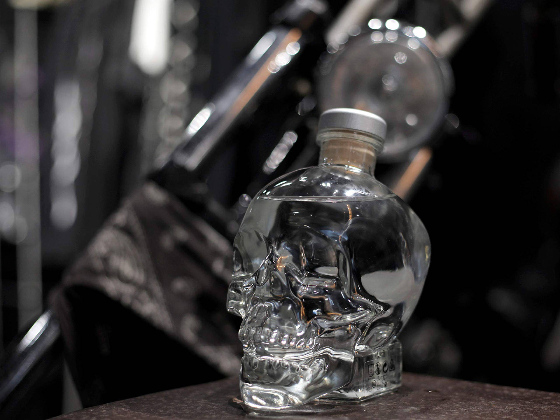 Crystal Head Vodka In An Industrial Setting Background