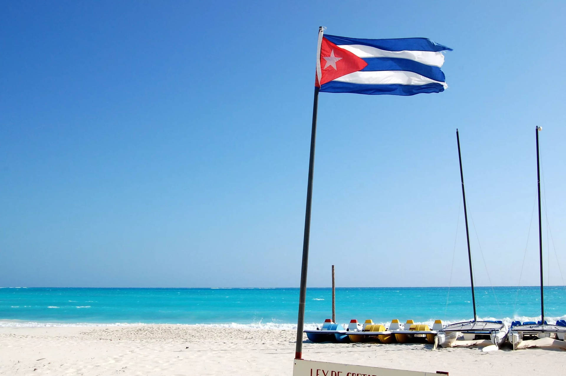 Cuban Flag On Pole Background