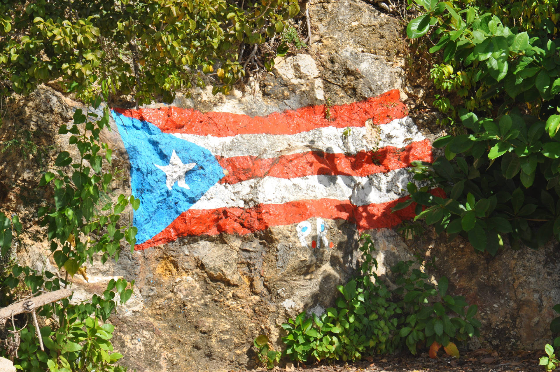 Cuban Flag Painted On Rock Background