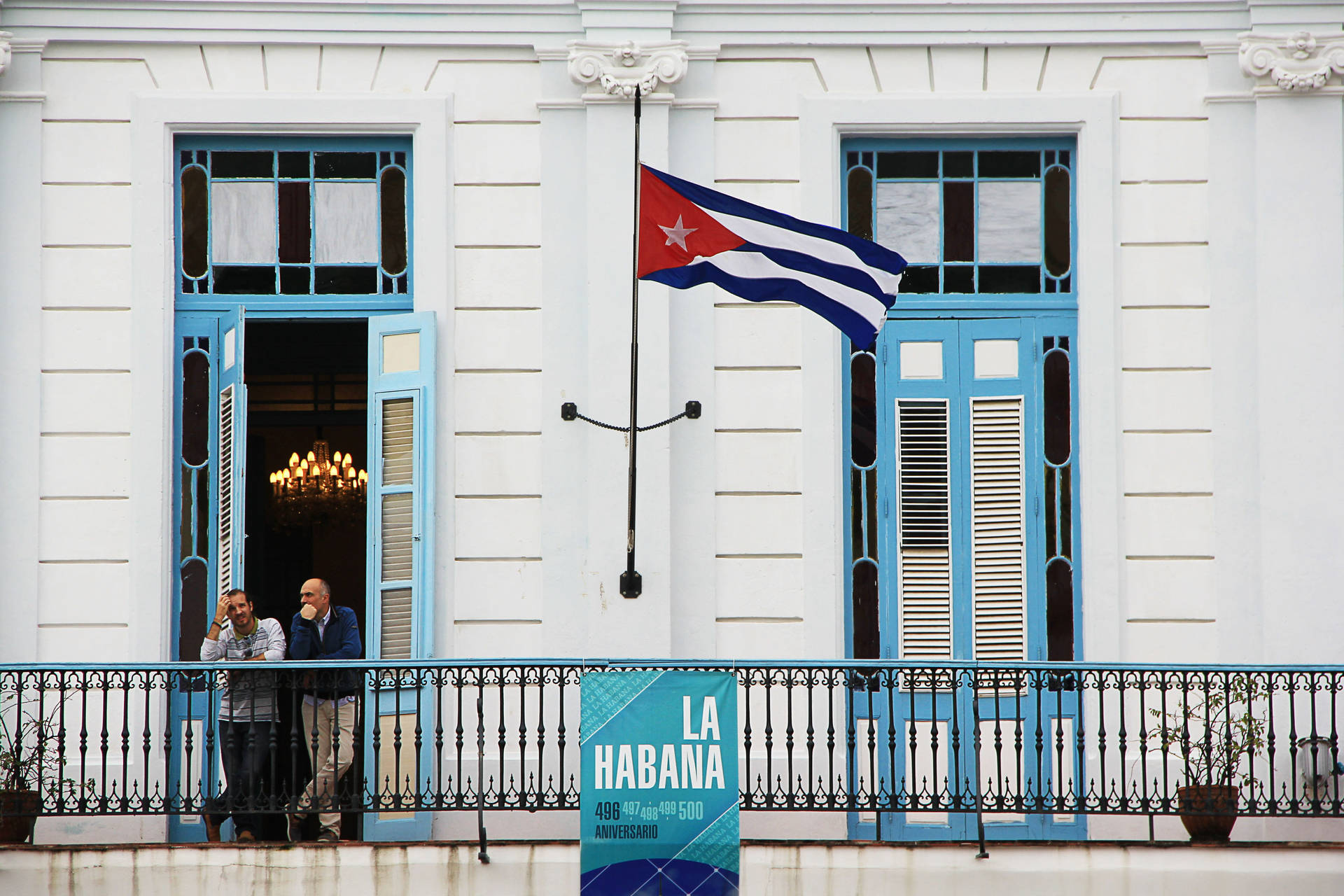 Cuban Flag People At Balcony Background