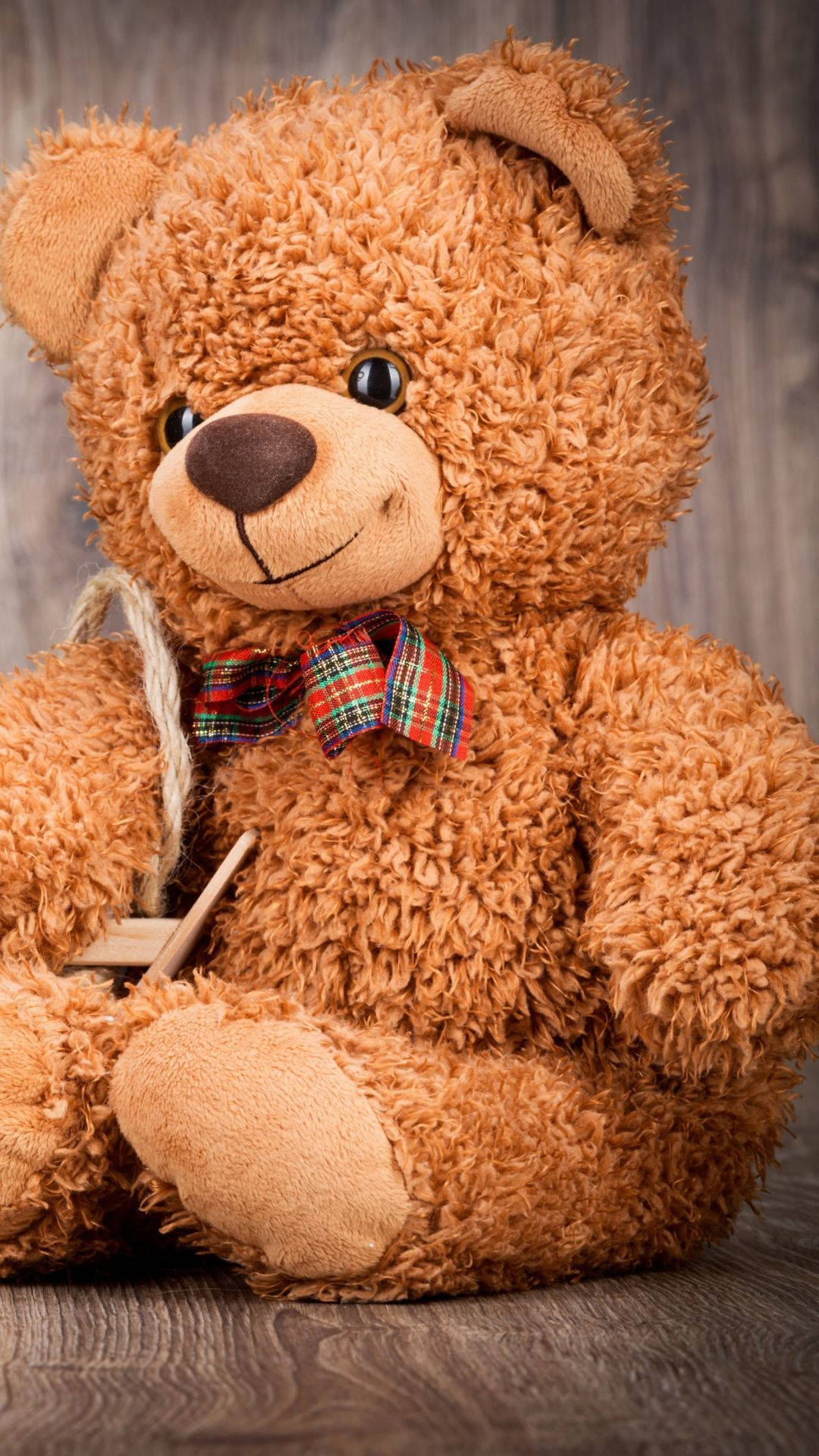 Cuddly Shaggy Brown Teddy Bear Background
