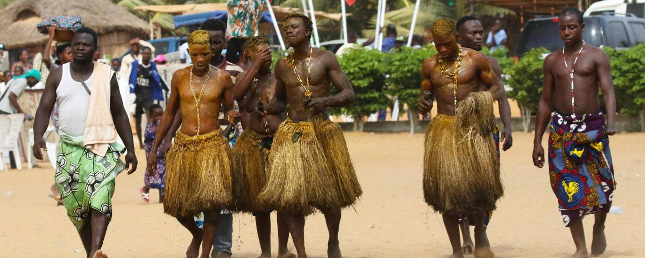 Cultural Costumes In Benin Background