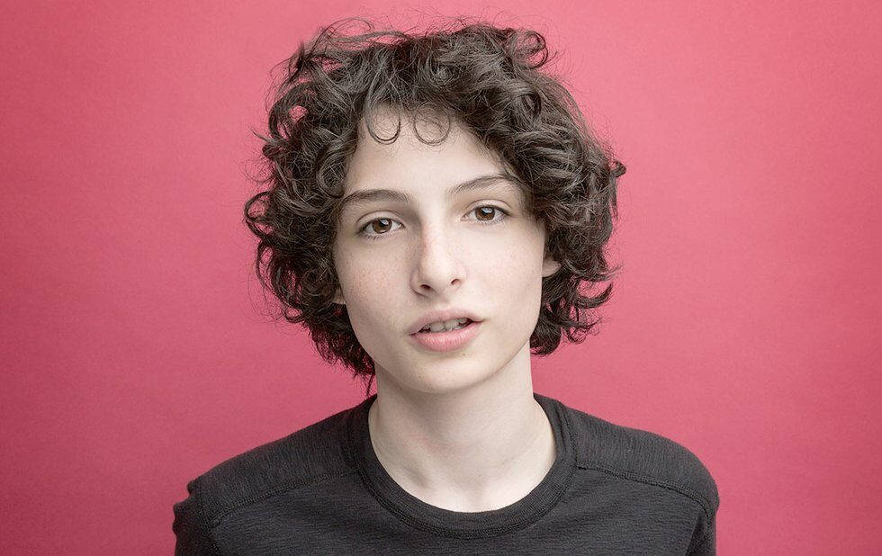 Curly-haired Finn Wolfhard