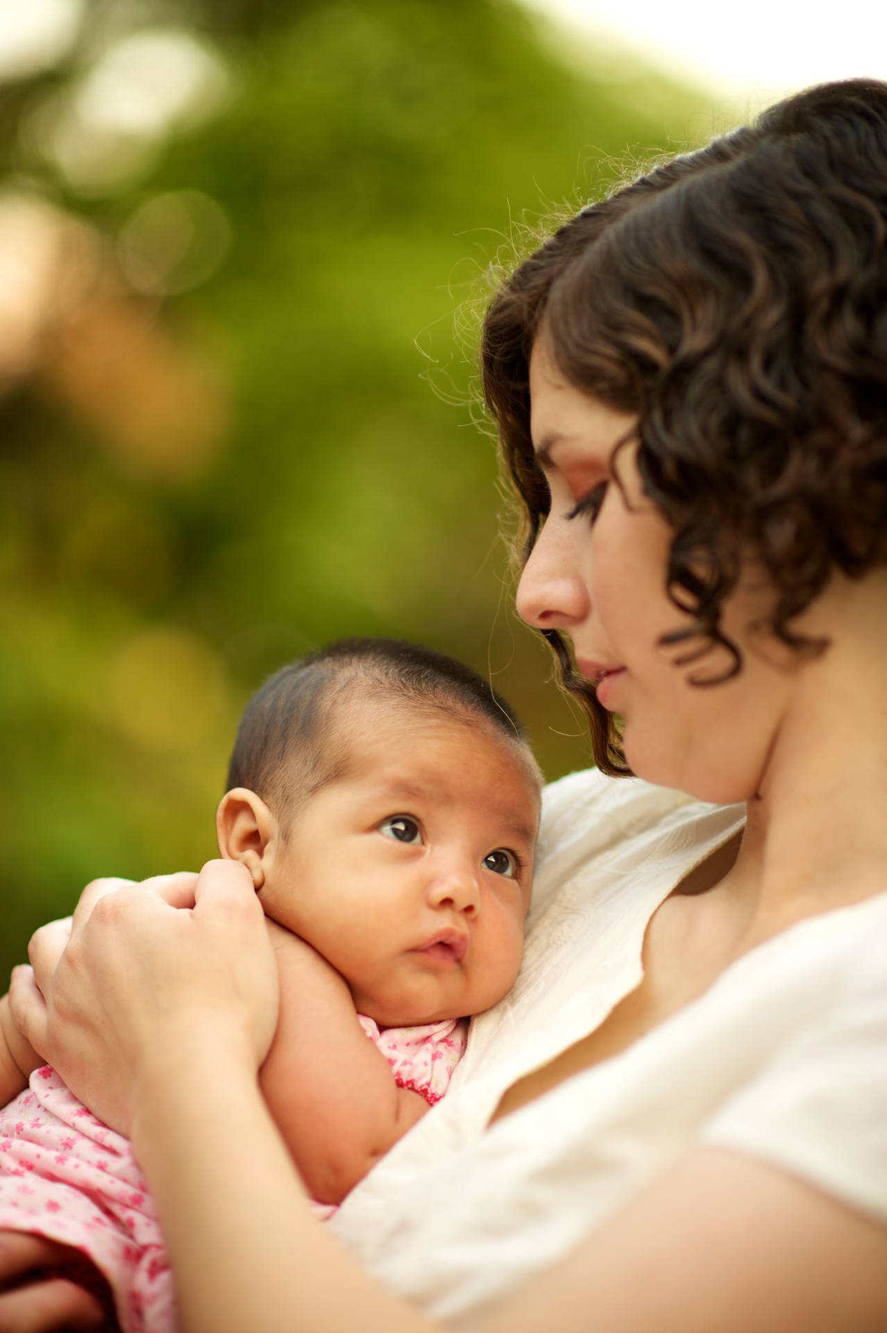 Curly Haired Mother And Cute Baby Background