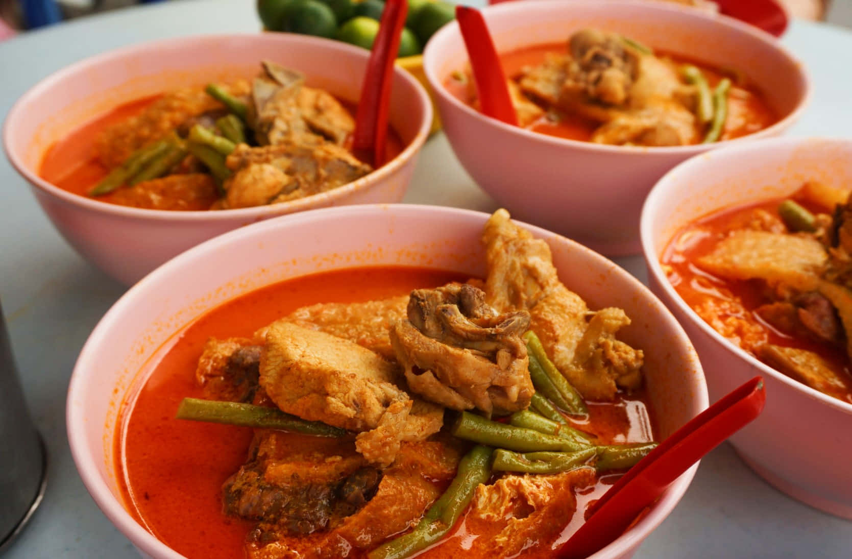 Curry Laksa On Four Pink Bowls