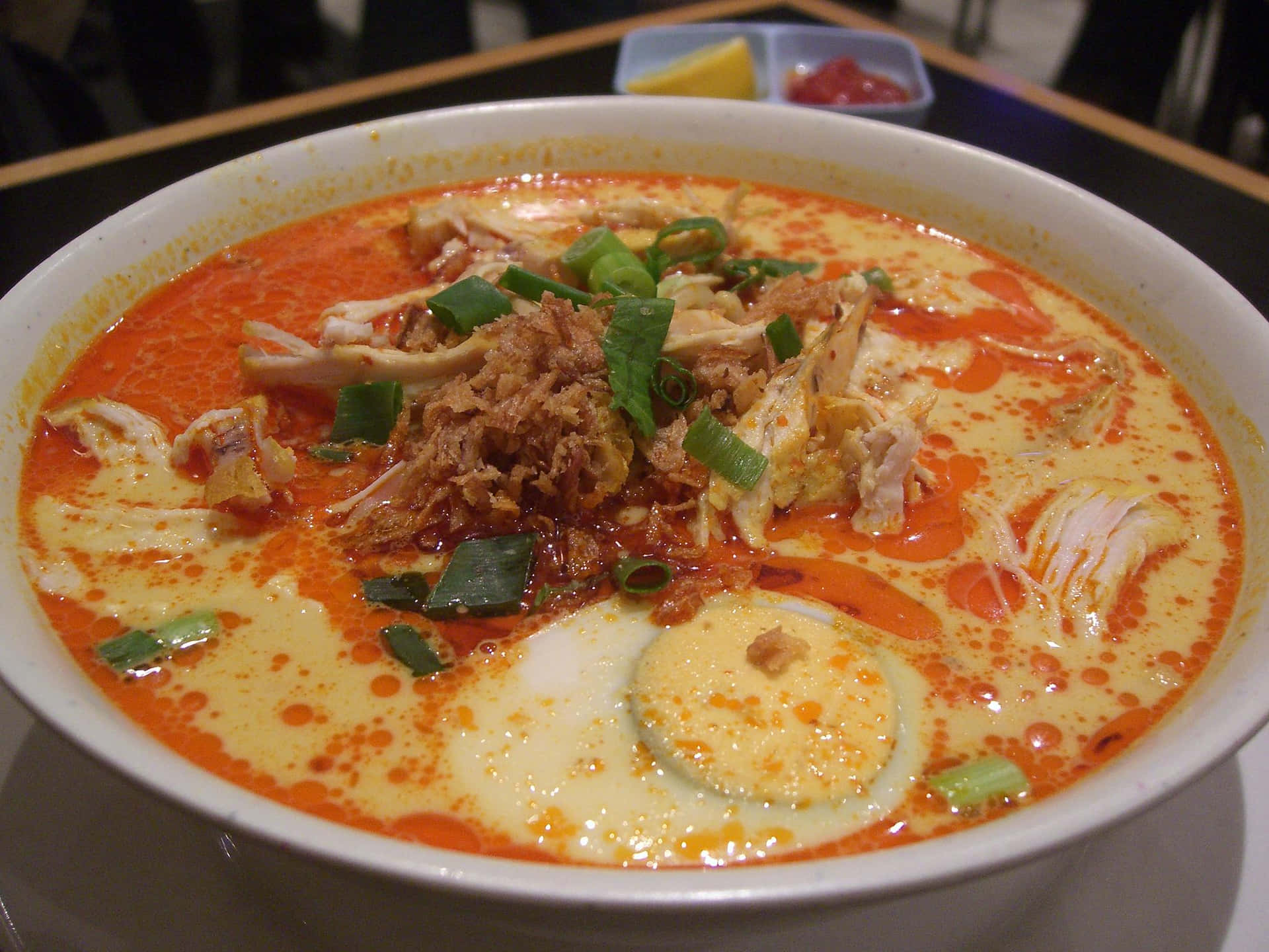 Curry Laksa With Tasty Orange And Yellow Broth