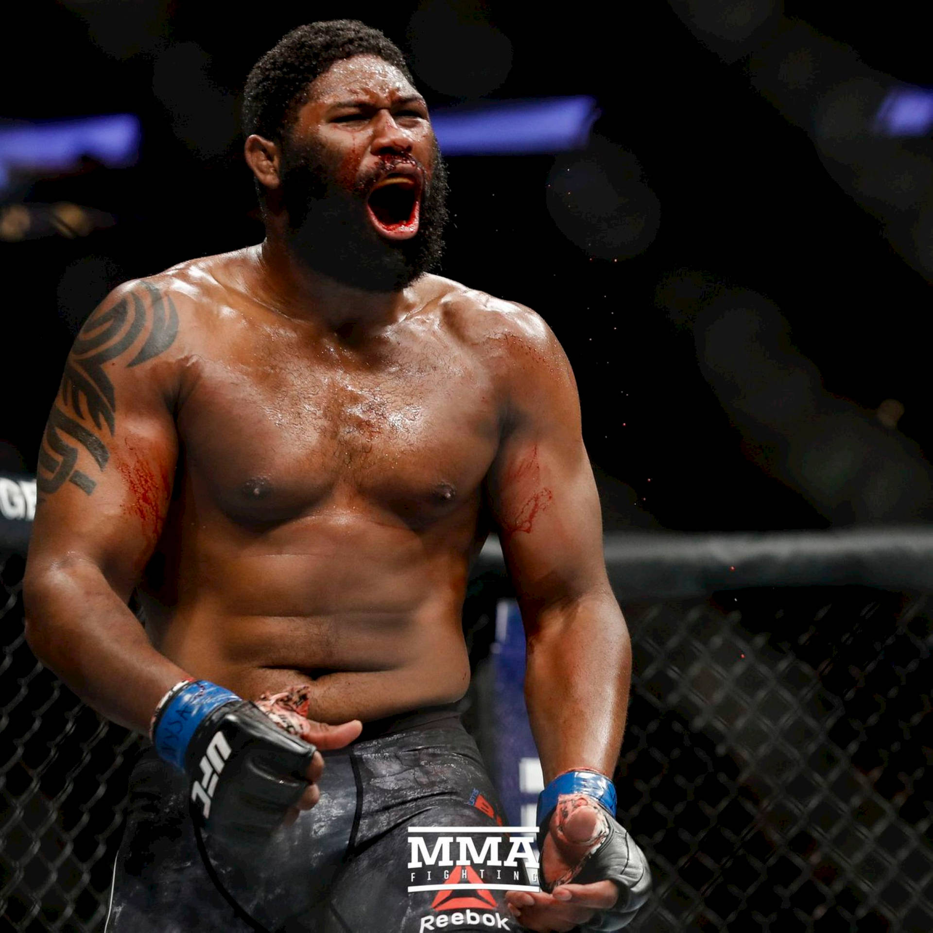 Curtis Blaydes Expressing Intense Emotion In The Octagon Background