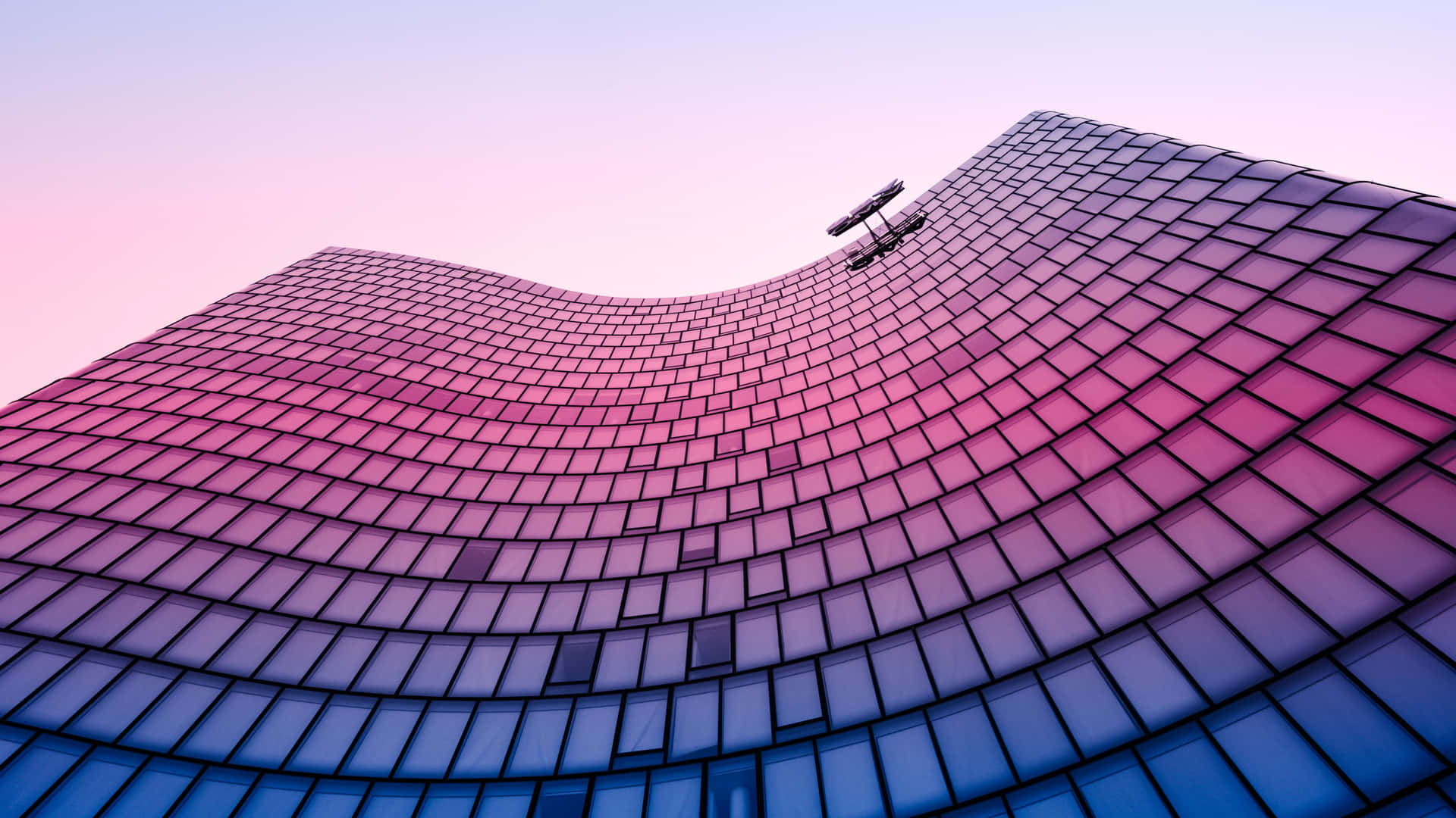 Curved Glass Facade Sunset Background