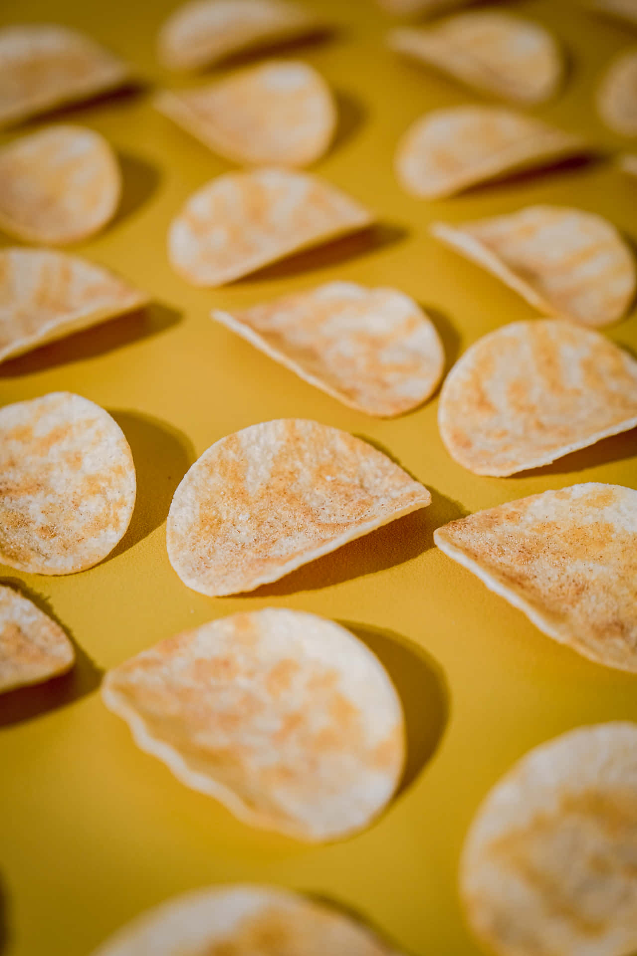 Curved Yellow Potato Chips Background