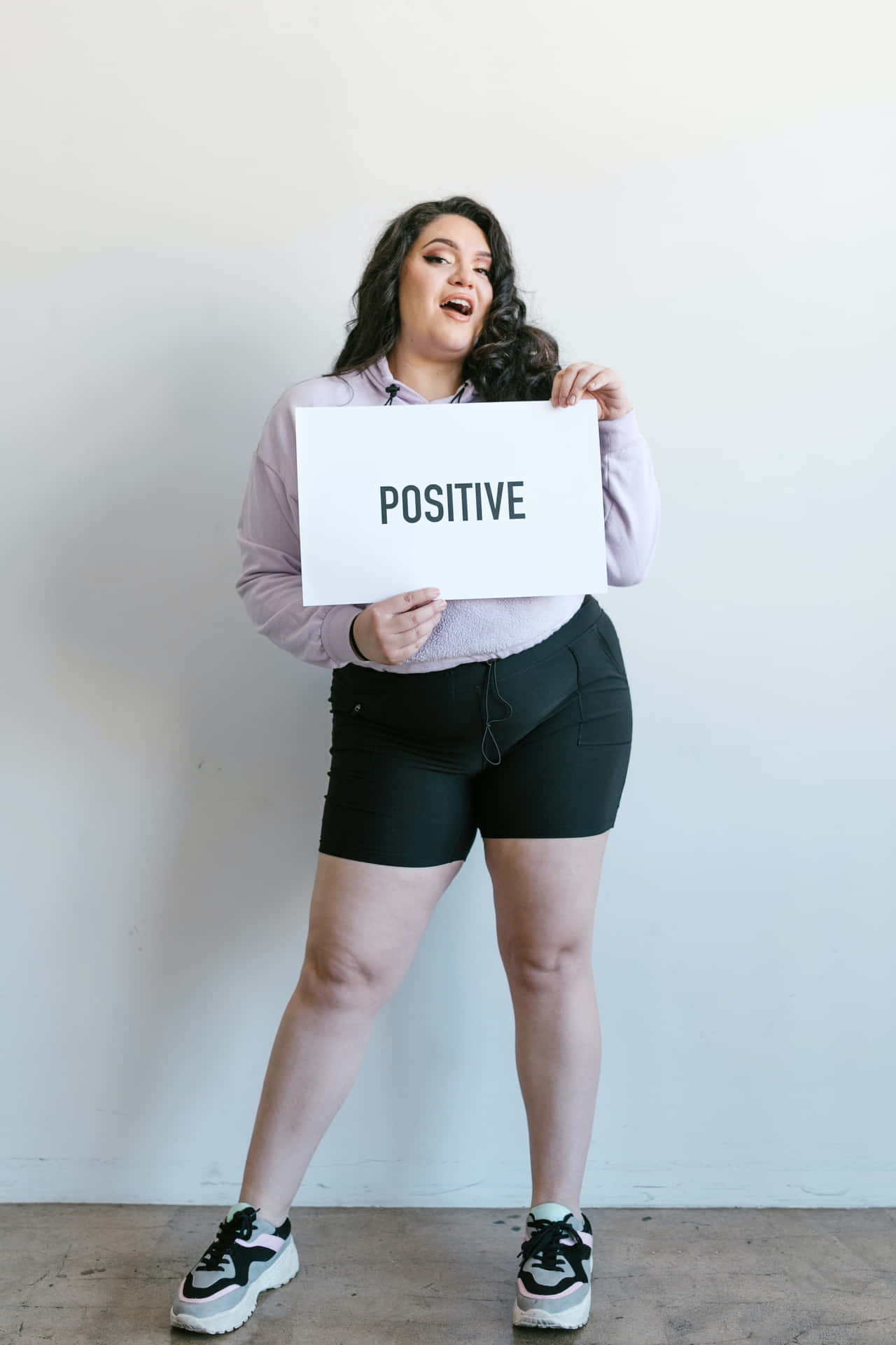 Curvy Woman Wearing Black Shorts Background