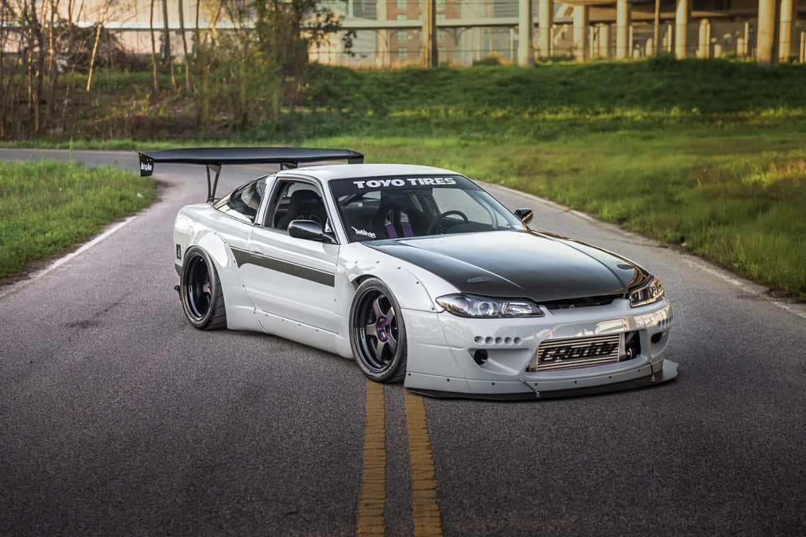 Customized Nissan240 S X On Road Background