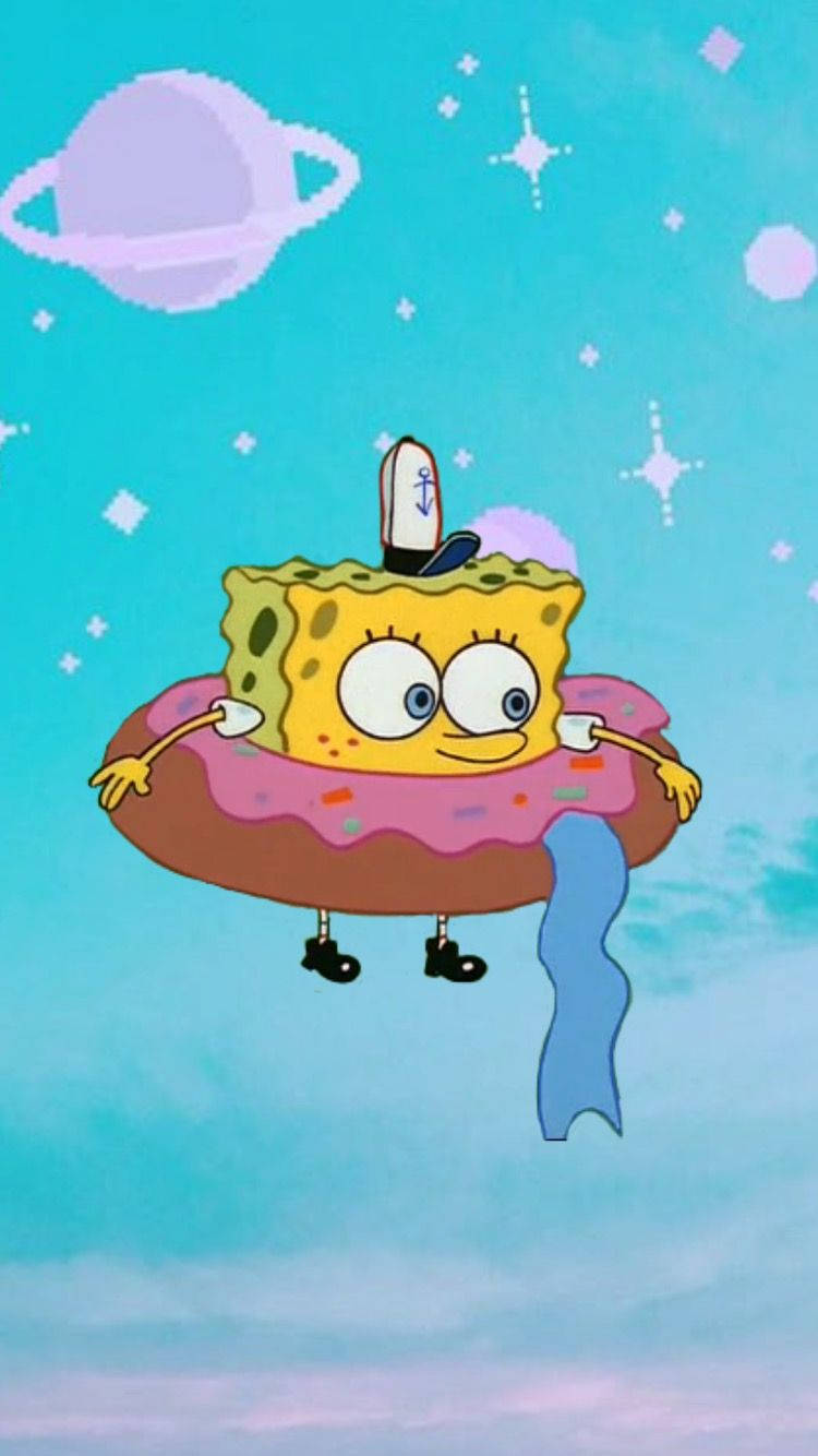 Cute Aesthetic Cartoon Spongebob With Doughnut Background