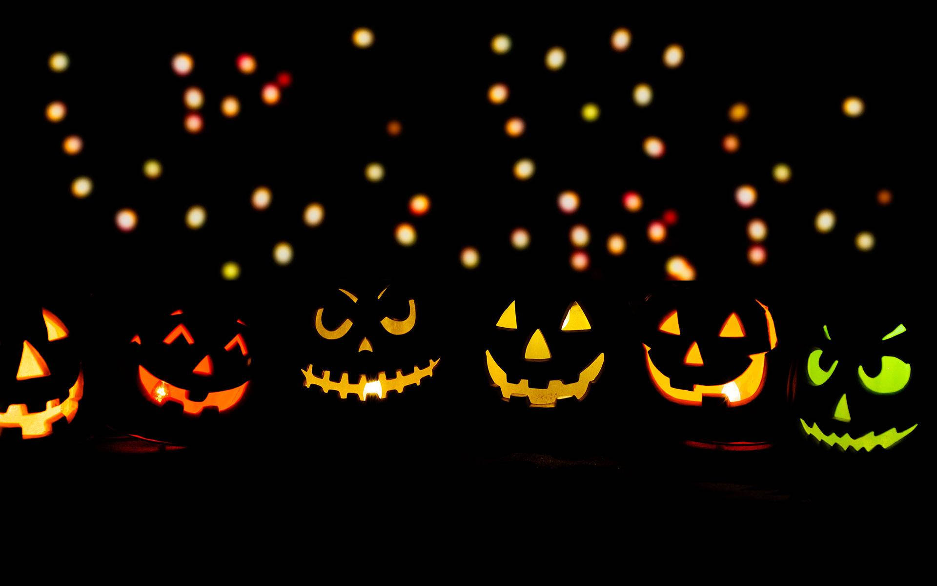 Cute Aesthetic Halloween Glowing Jack-o'-lanterns Background